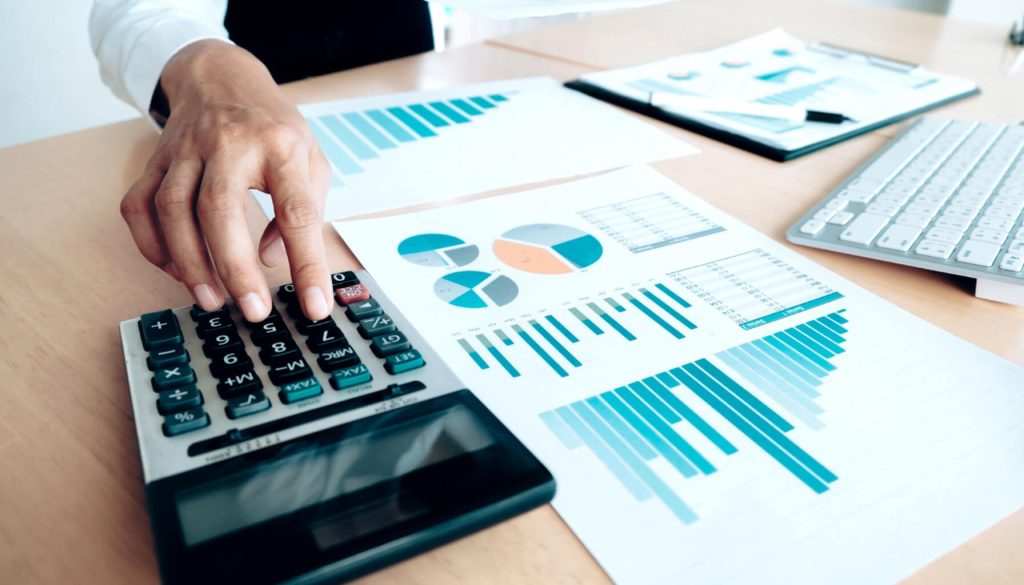Finances Saving Economy concept. Female accountant or banker use calculator